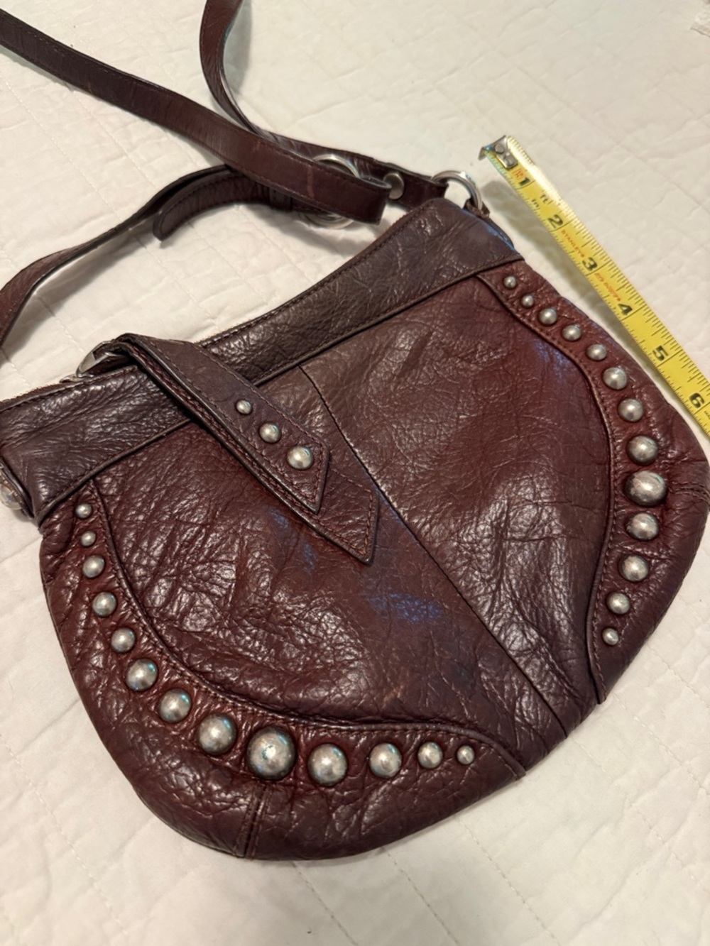 Brown leather crossbody purse by B Makowsky.